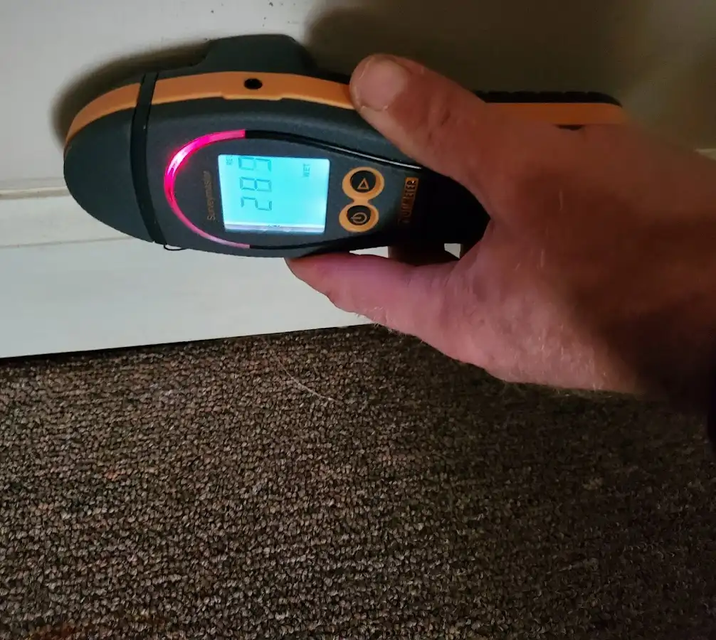 Moisture detection at baseboard during Burst Pipe Cleanup in Leonardtown